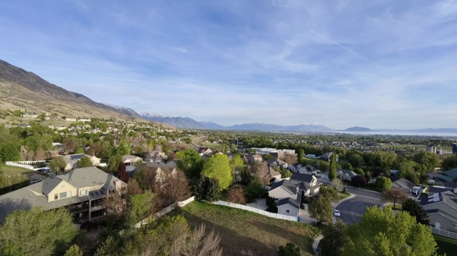 A Utah County neighborhood street of established homes